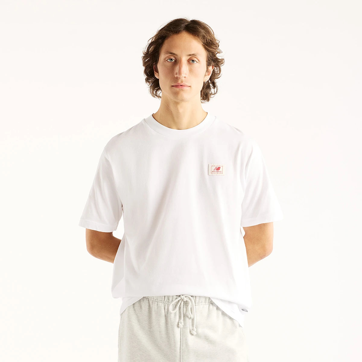 CAMISETA NEW BALANCE WOVEN LABEL