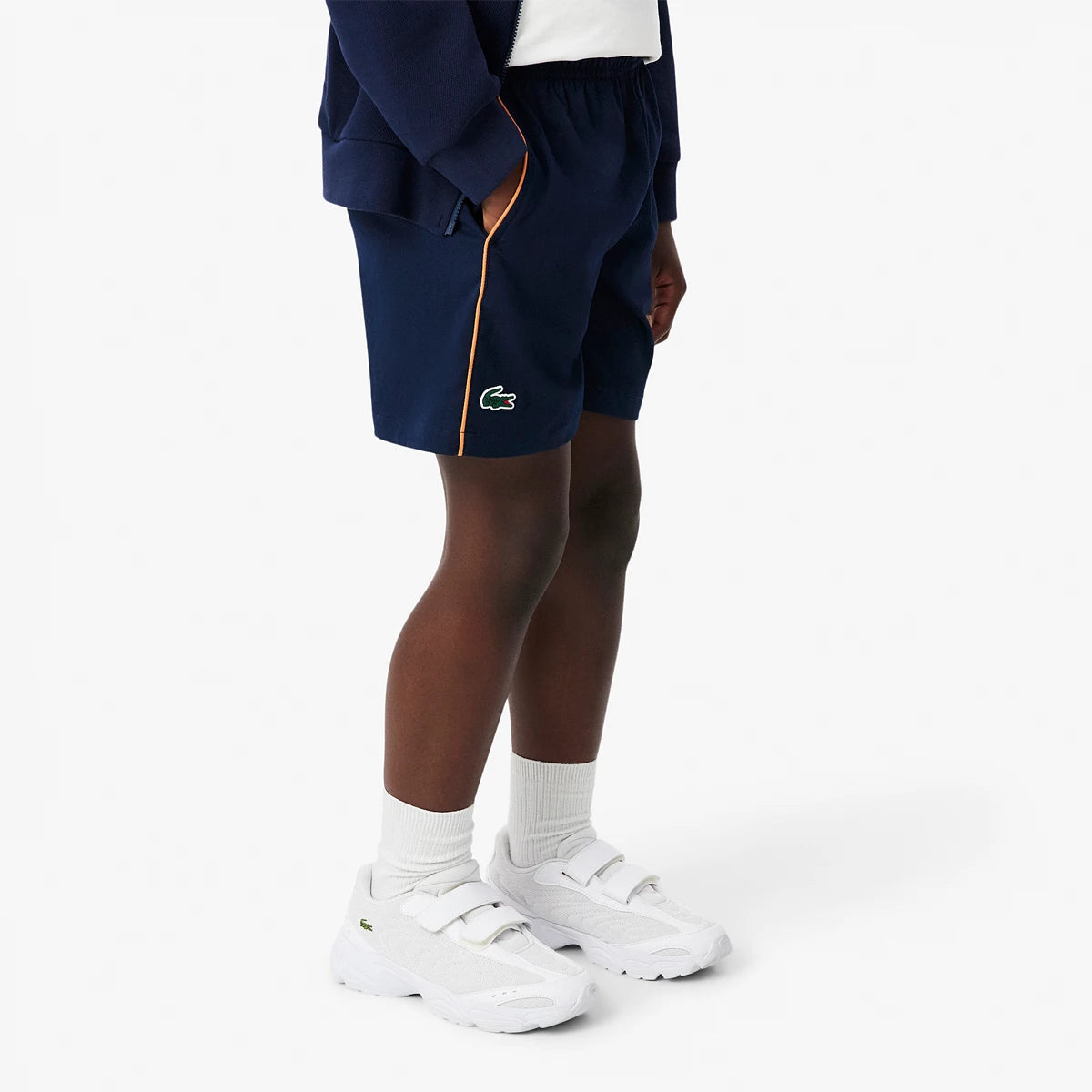 PANTALÓN CORTO LACOSTE ROLAND-GARROS JUNIOR BALL KID