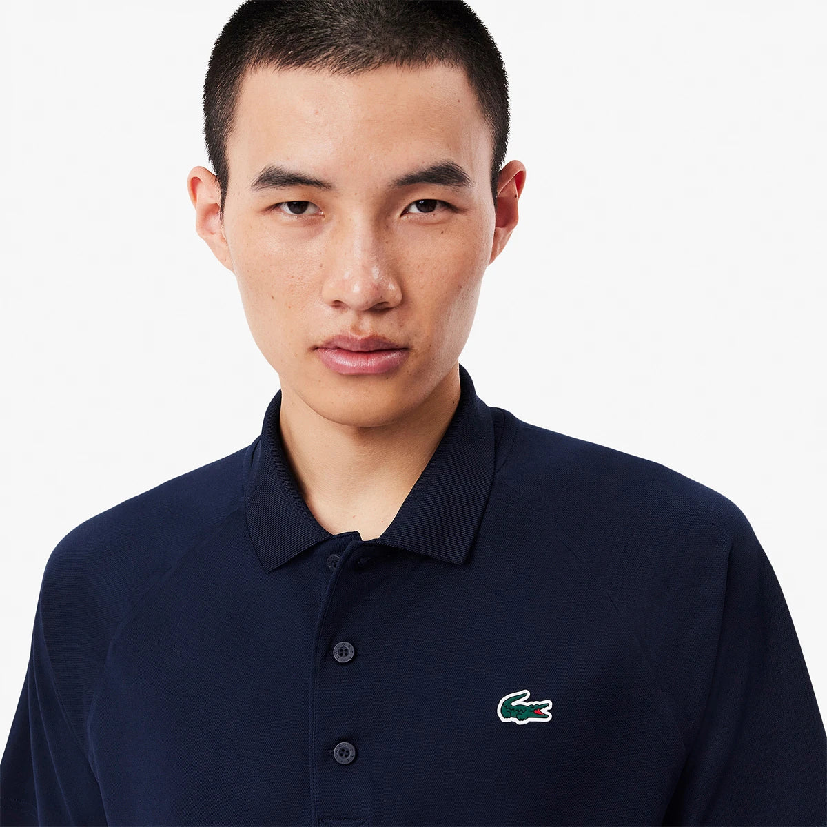 POLO LACOSTE CORE PERFORMANCE SPORT RAGLAN