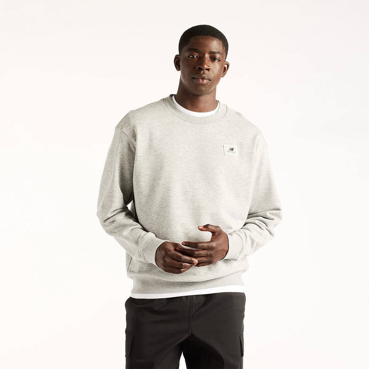SUDADERA NEW BALANCE WOVEN LABEL