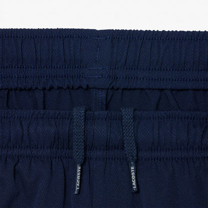 PANTALÓN CORTO LACOSTE ROLAND-GARROS JUNIOR BALL KID