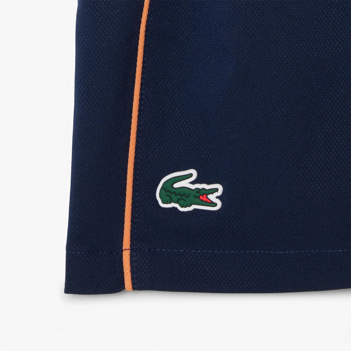 PANTALÓN CORTO LACOSTE ROLAND-GARROS JUNIOR BALL KID