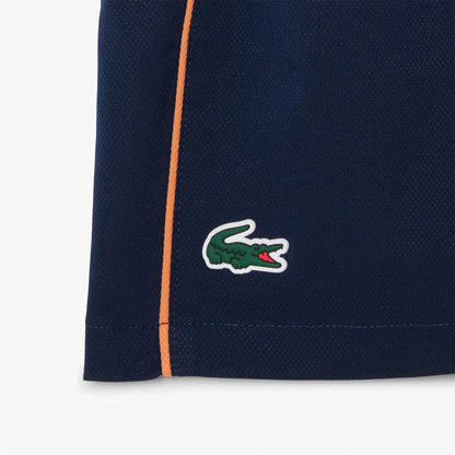 PANTALÓN CORTO LACOSTE ROLAND-GARROS JUNIOR BALL KID