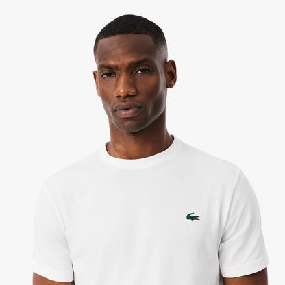 CAMISETA LACOSTE CORE PERFORMANCE TRAINING GRÁFICA PELOTA