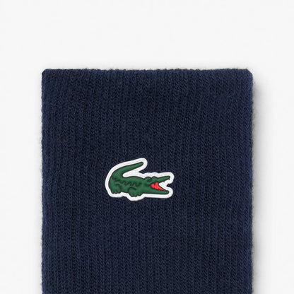 MUÑEQUERAS LACOSTE ROLAND GARROS